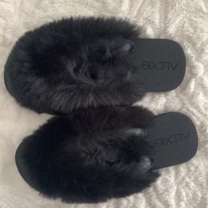 Super fun fuzzy black flip-flops sandals. Brand new and never worn!